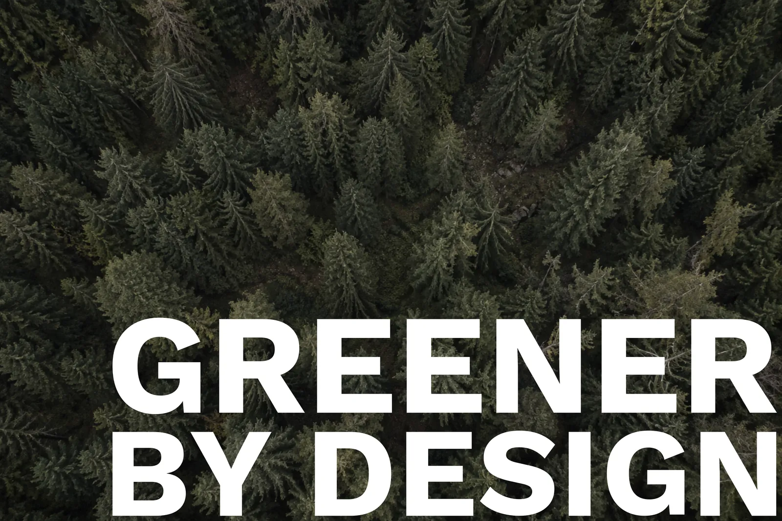 Aerial view of a dense evergreen forest with the words Greener by Design, for Java Jacket's recycled, compostable coffee sleeves