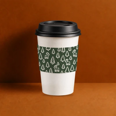 Eco II Large White Holiday 2026 coffee sleeve, green trees and reindeer print